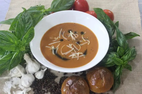 Roasted tomato soup with Basil and Cheddar Cheese cheese.